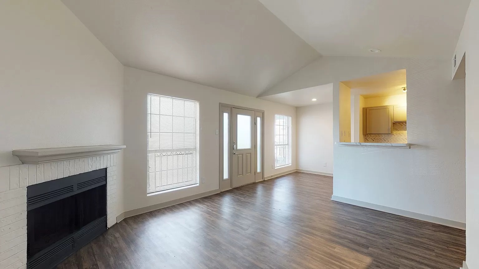 Renovated living room with fireplace at 1540 Apartments