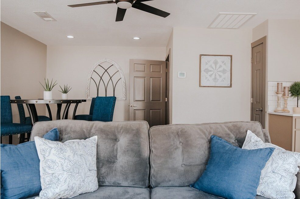 Renovated living room, representative of the 2 bed · 2 bath home at 1540 Apartments